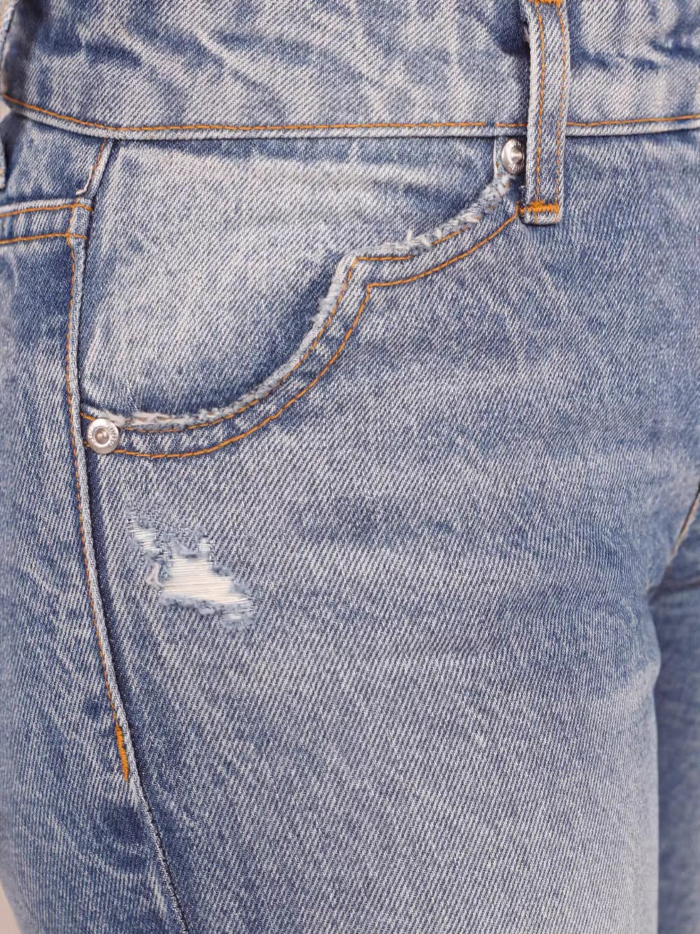 Flared Denim Jeans With A Retro Y2K Vibe Featuring A Washed And Distressed Finish For A Cool Edgy Look